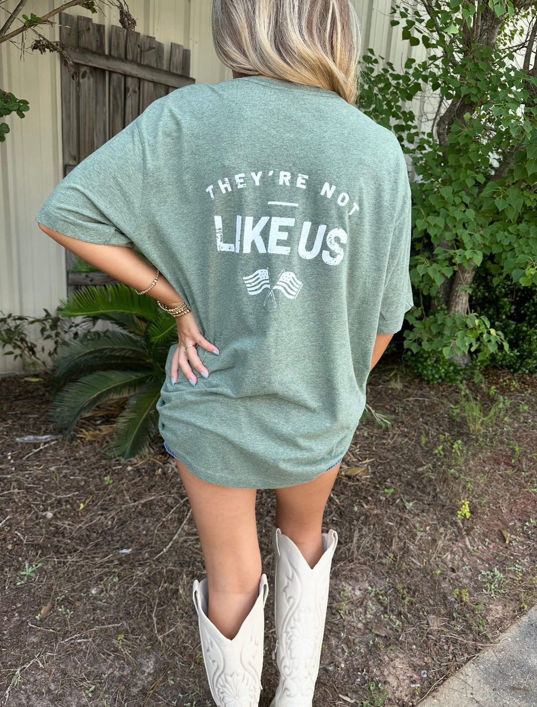 They’re Not Like Us Heather green tee