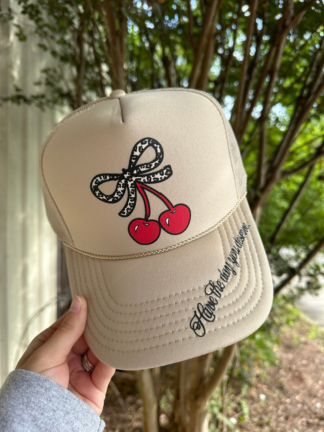 Have The Day You Deserve Tan Trucker Hat
