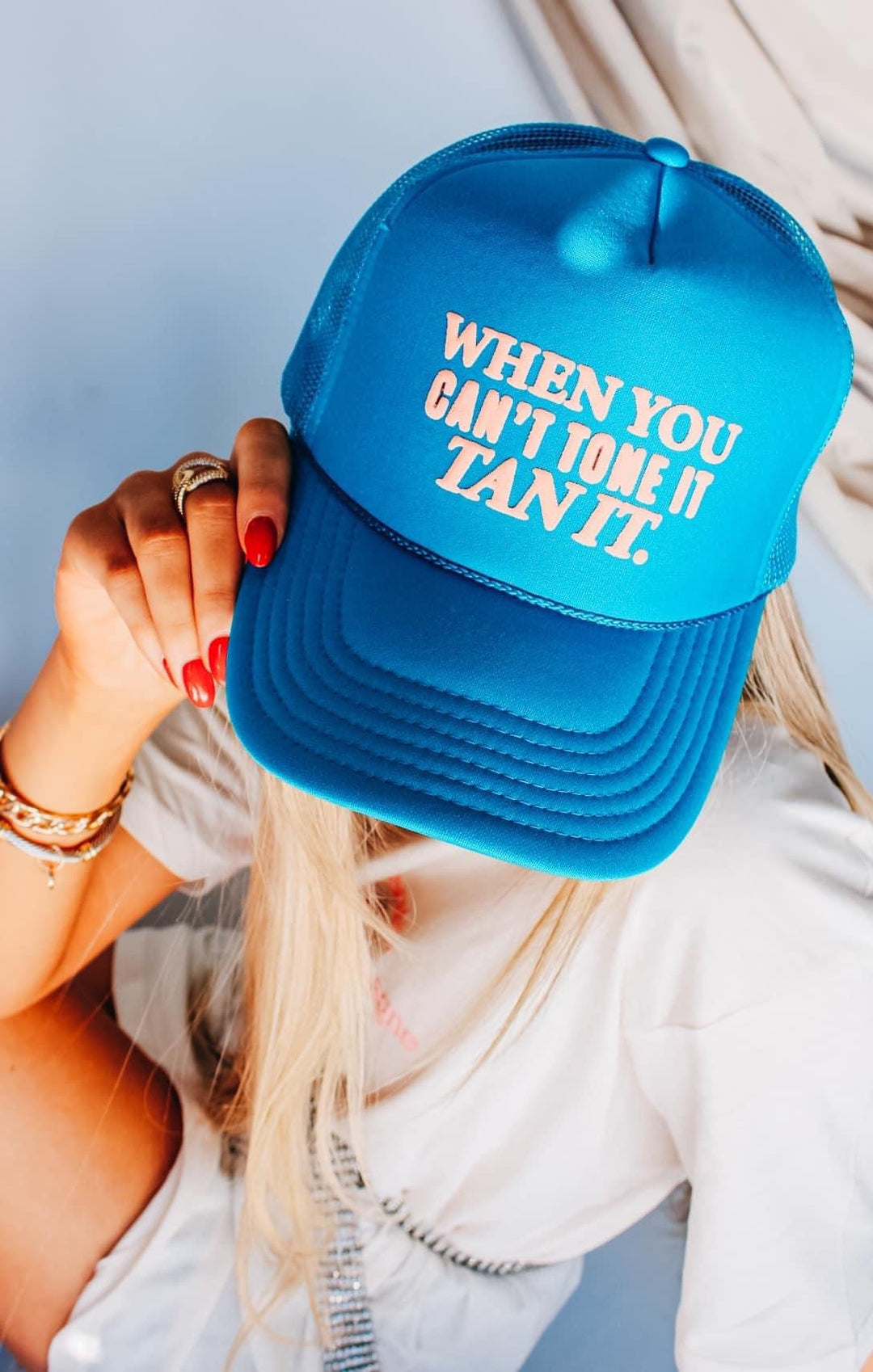 When you Can’t Tone it, Tan it blue Trucker Hat