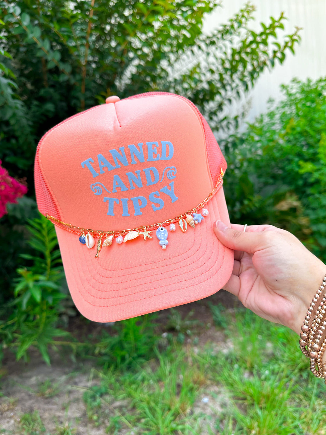 Tanned and Tipsy Coral Trucker Hat