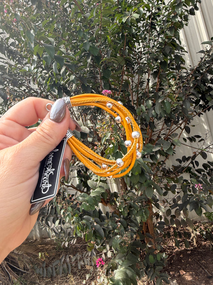 Yellow gold leather wrap bracelet
