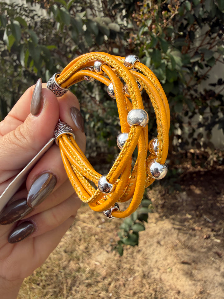 Yellow gold leather wrap bracelet