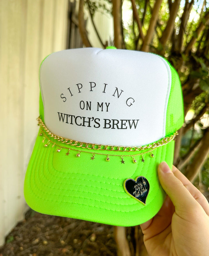 Sipping On My Witch's Brew White & Neon Green Trucker