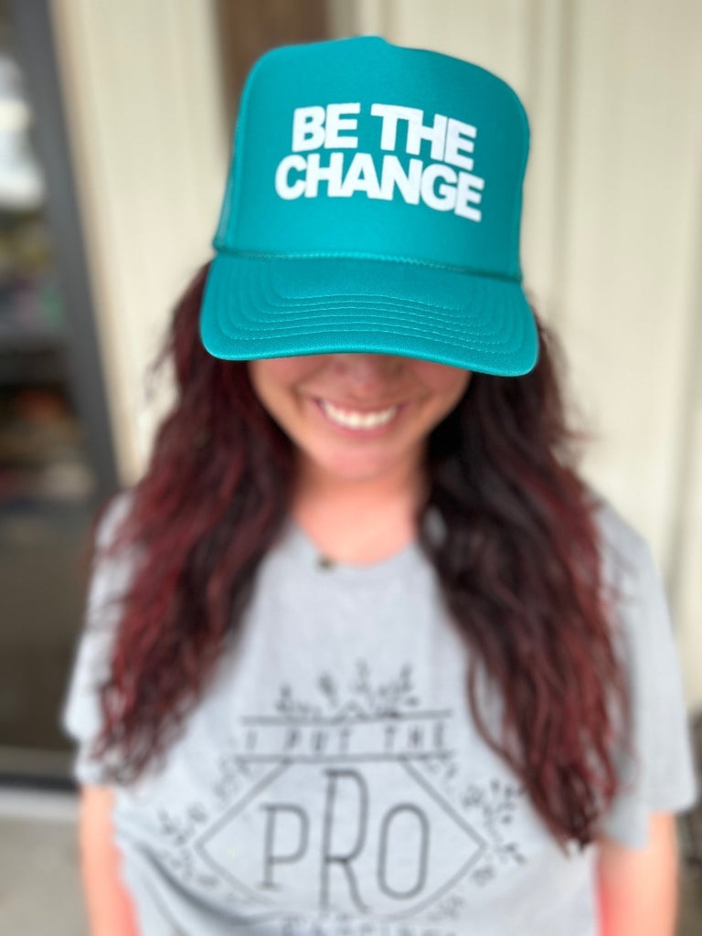 Be the Change teal trucker hat