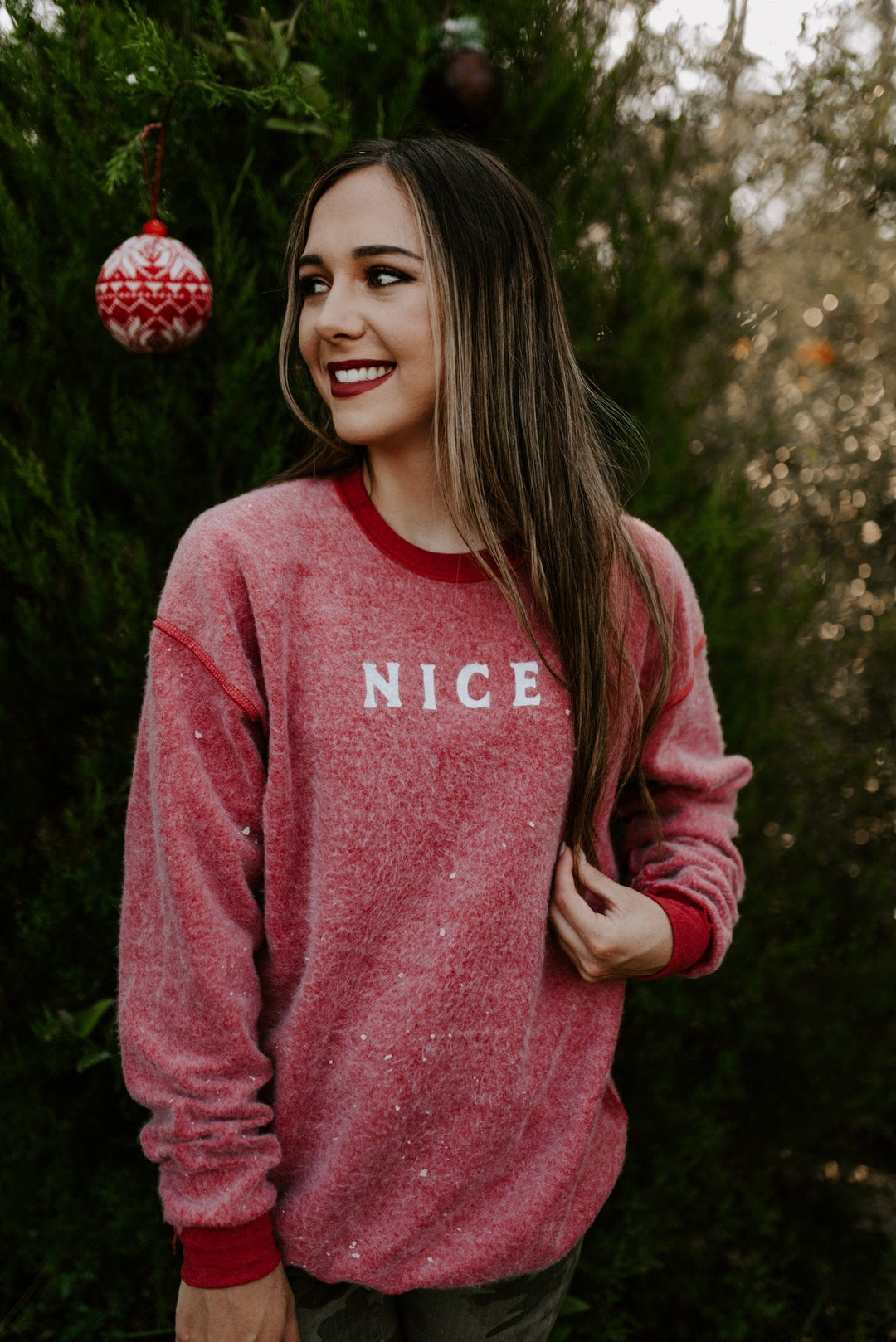 Naughty Nice Reversible Red Bomba Sweatshirt